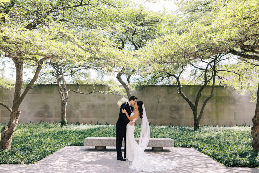 A wedding portrait captured in the South Garden of the Art Institute of Chicago