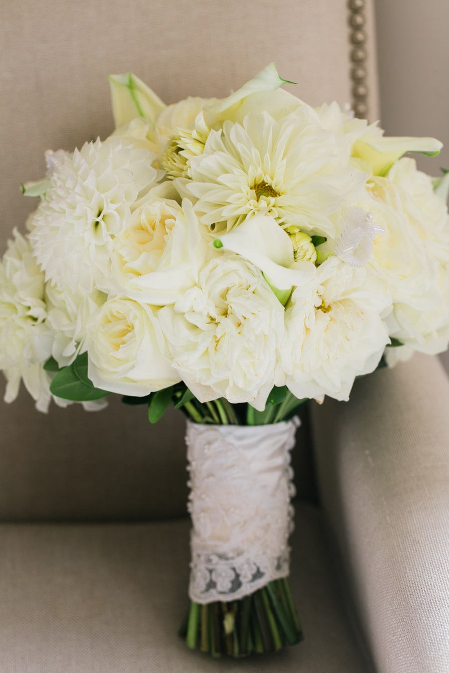 A beautiful all white bridal bouquet by Stems in Chicago