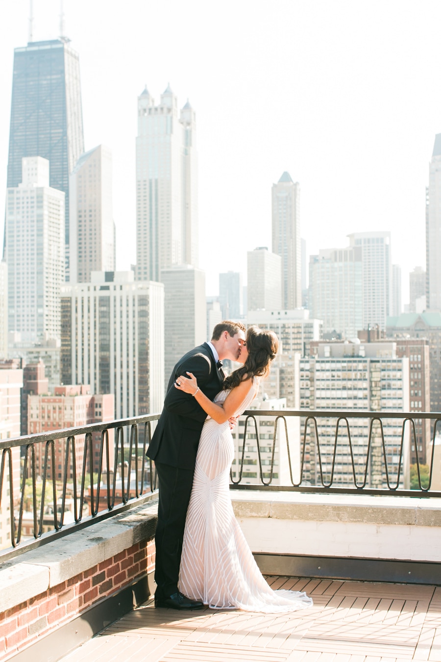 A stunning wedding first look moment on the rooftop of the Ambassador Hotel in Chicago.