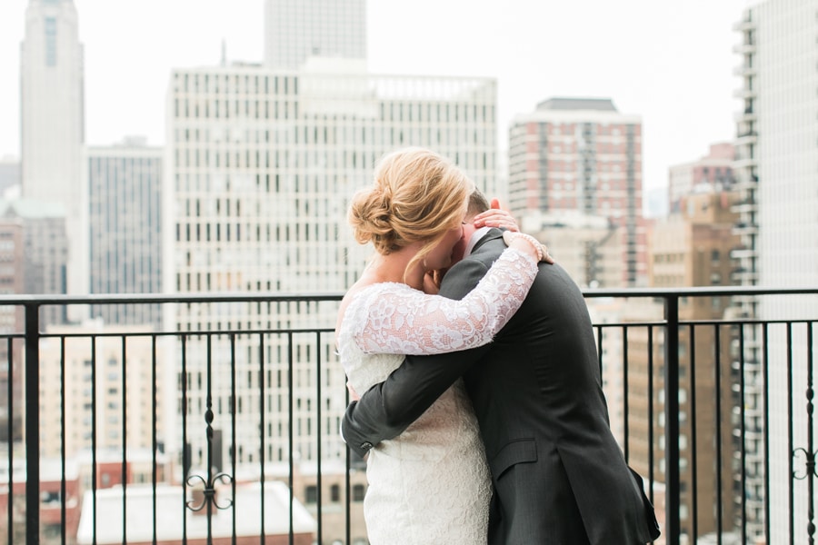 A bride and groom share a first look moment at the rooftop of the Ambassador Hotel in Chicago.