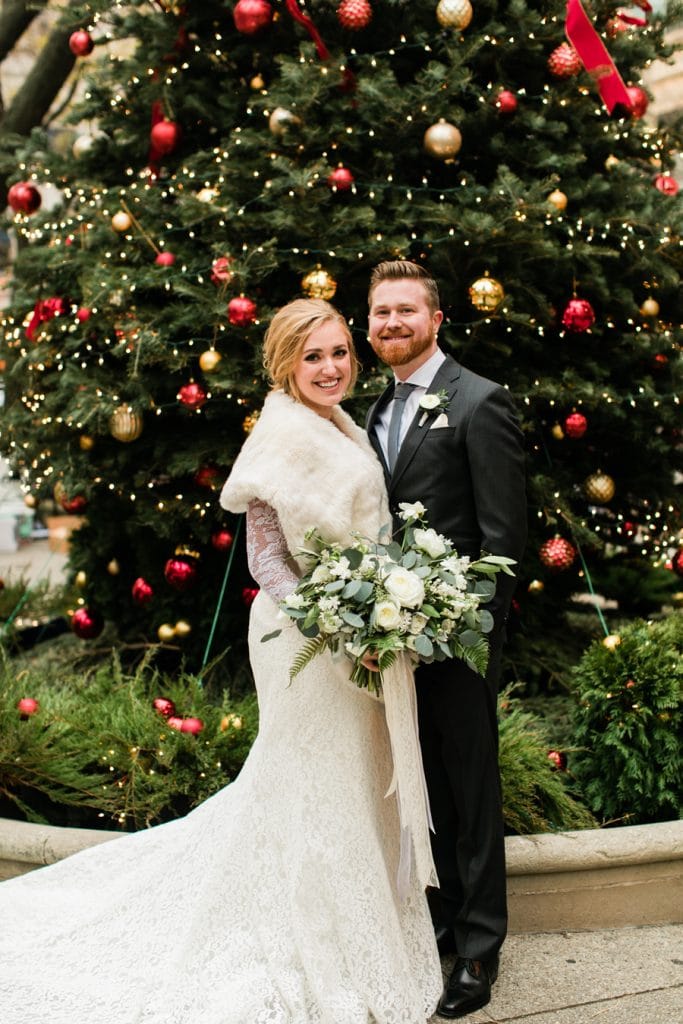The beautiful Christmas decor in downtown Chicago made for a beautiful backdrop for this winter wedding portrait.