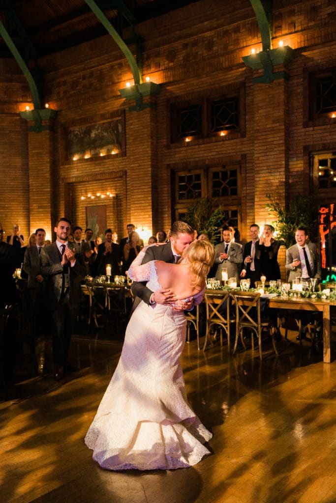 A bride and groom share their first dance at Cafe Brauer.
