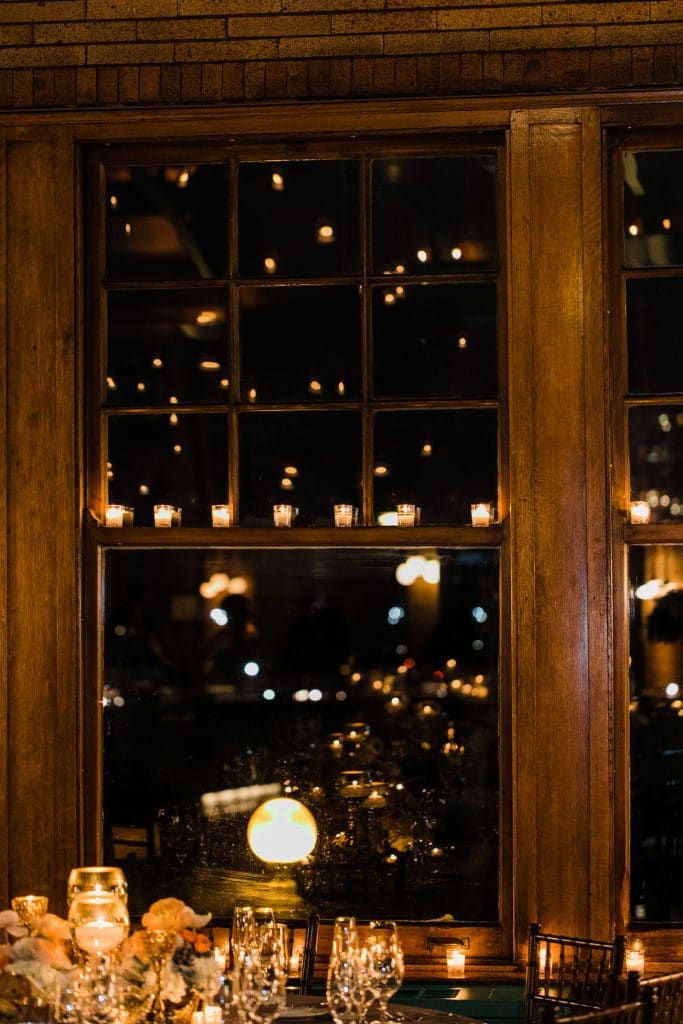 The candlelight reflected into the windows of Cafe Brauer.