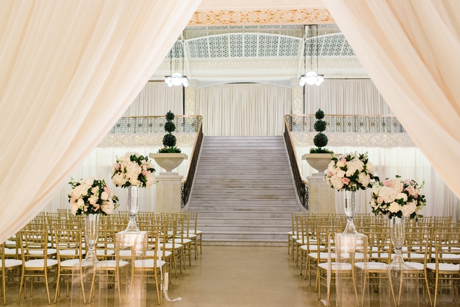 A romantic wedding ceremony at the Rookery designed by the Life in Bloom team in Chicago.