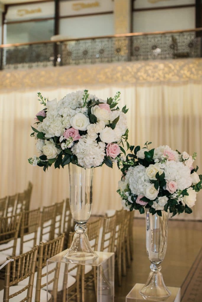 A romantic wedding ceremony at the Rookery designed by the Life in Bloom team in Chicago.