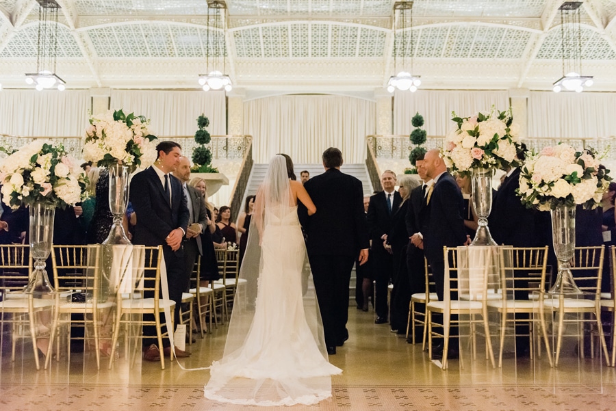 A bride's entrance to the ceremony at the Rookery in Chicago.