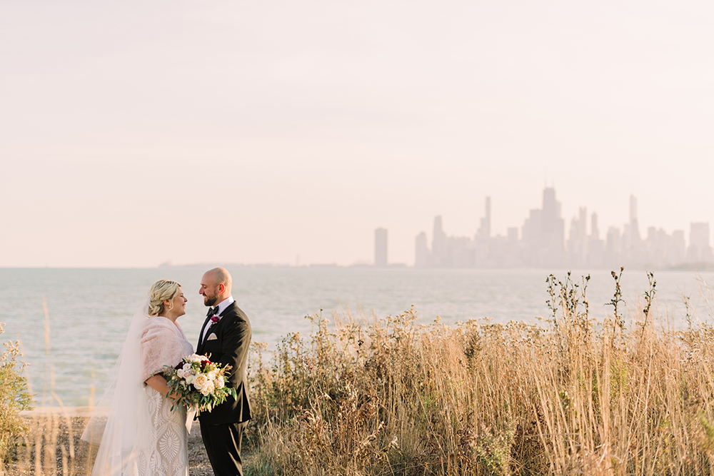 Sunset wedding portrait at Montrose Harbor in Chicago