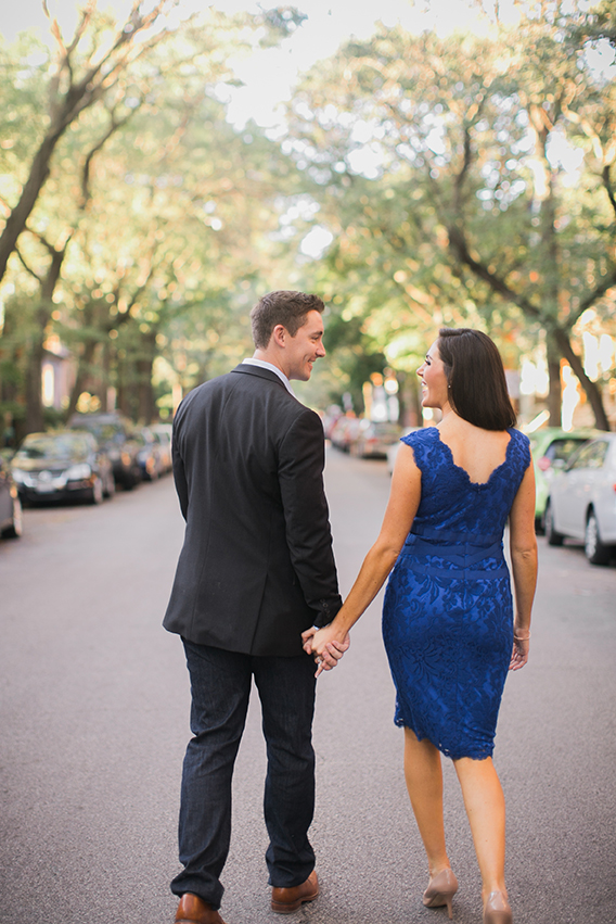 Couple stroll through Lincoln Park neighborhood for Chicago engagement photo