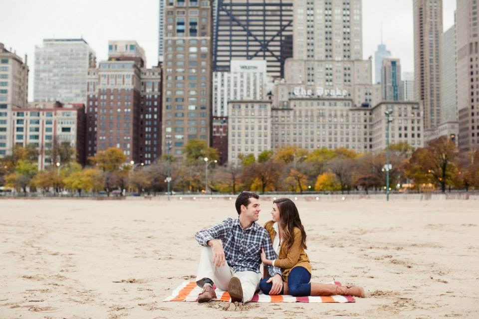 Engagement photo at Oak Street Beach in Chicago