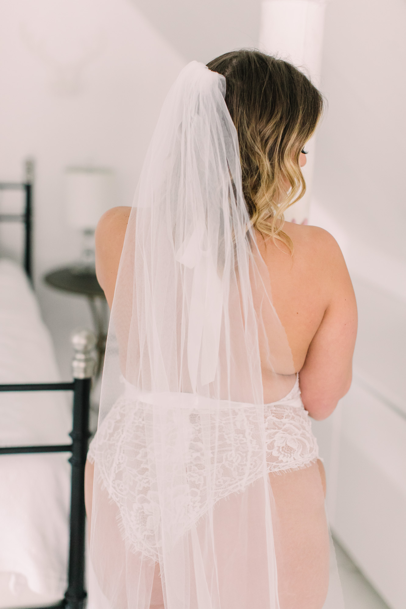 A wedding veil bridal boudoir photo