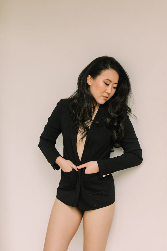 A chic black blazer is an effortlessly chic boudoir outfit idea
