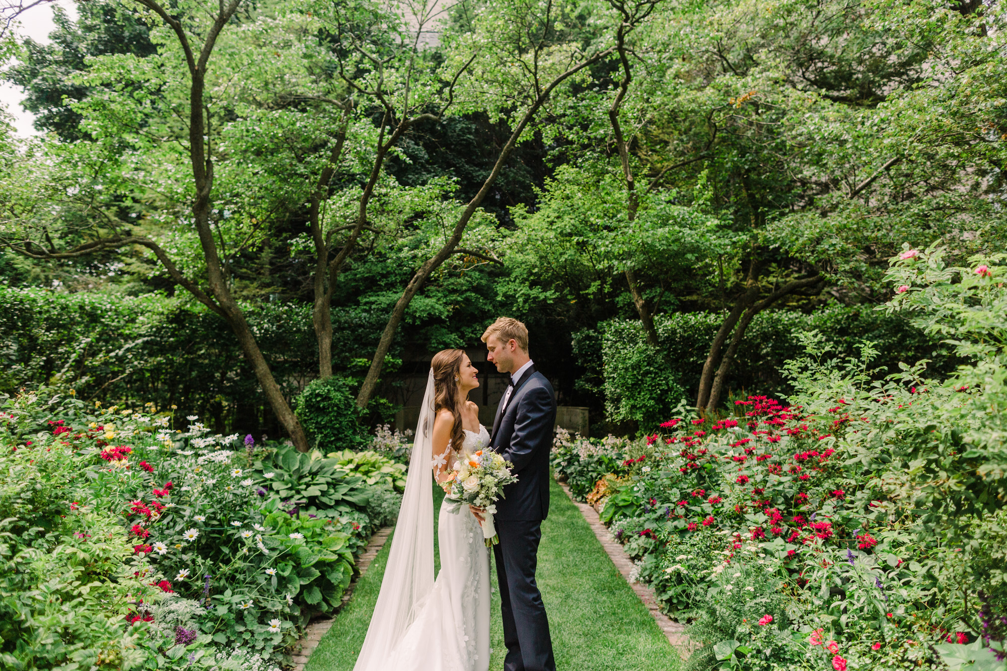 Wedding portrait in the Shakespeare Garden of Northwestern University.