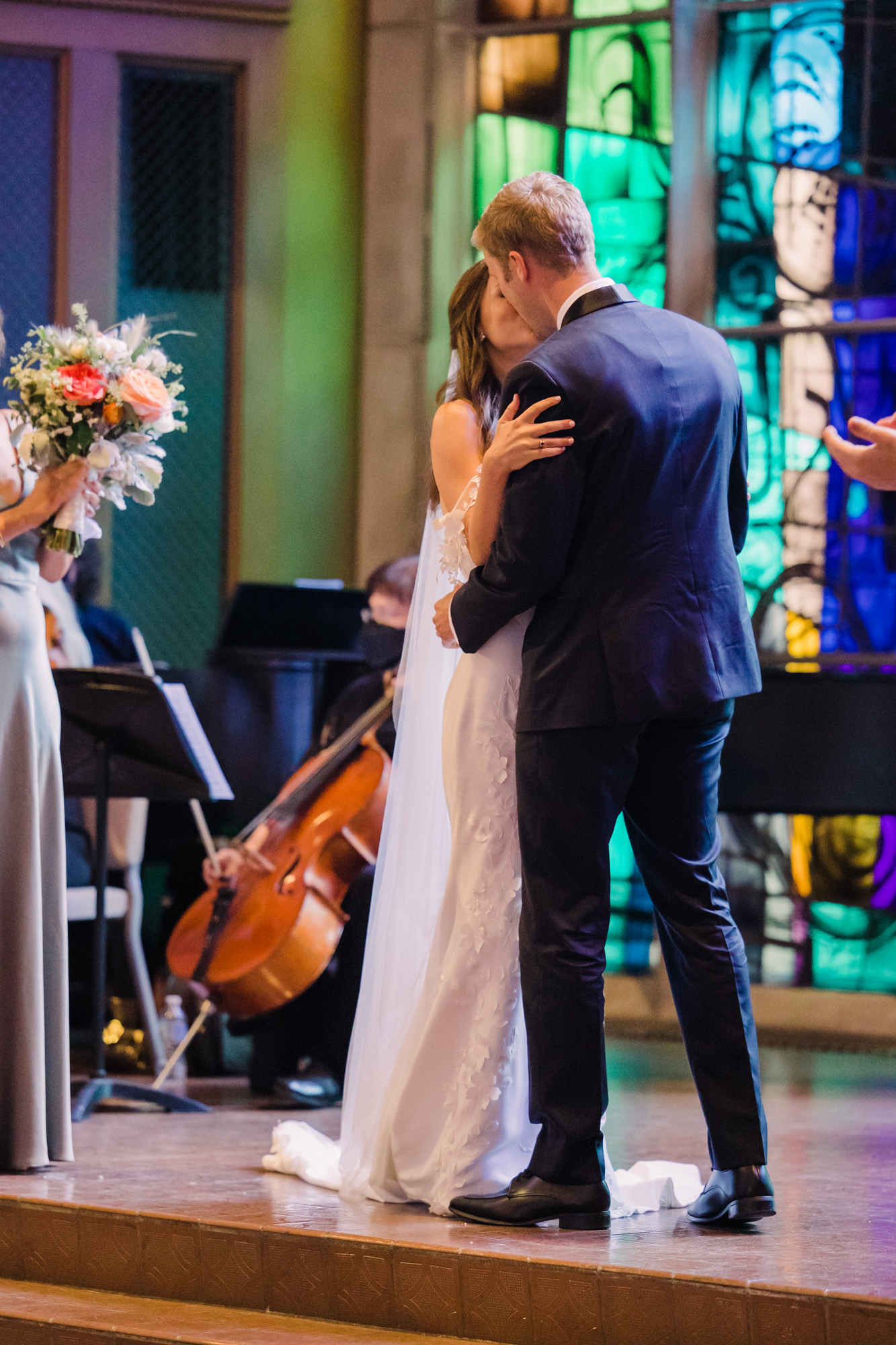  Bride and groom share a first kiss in Alice Millar Chapel.
