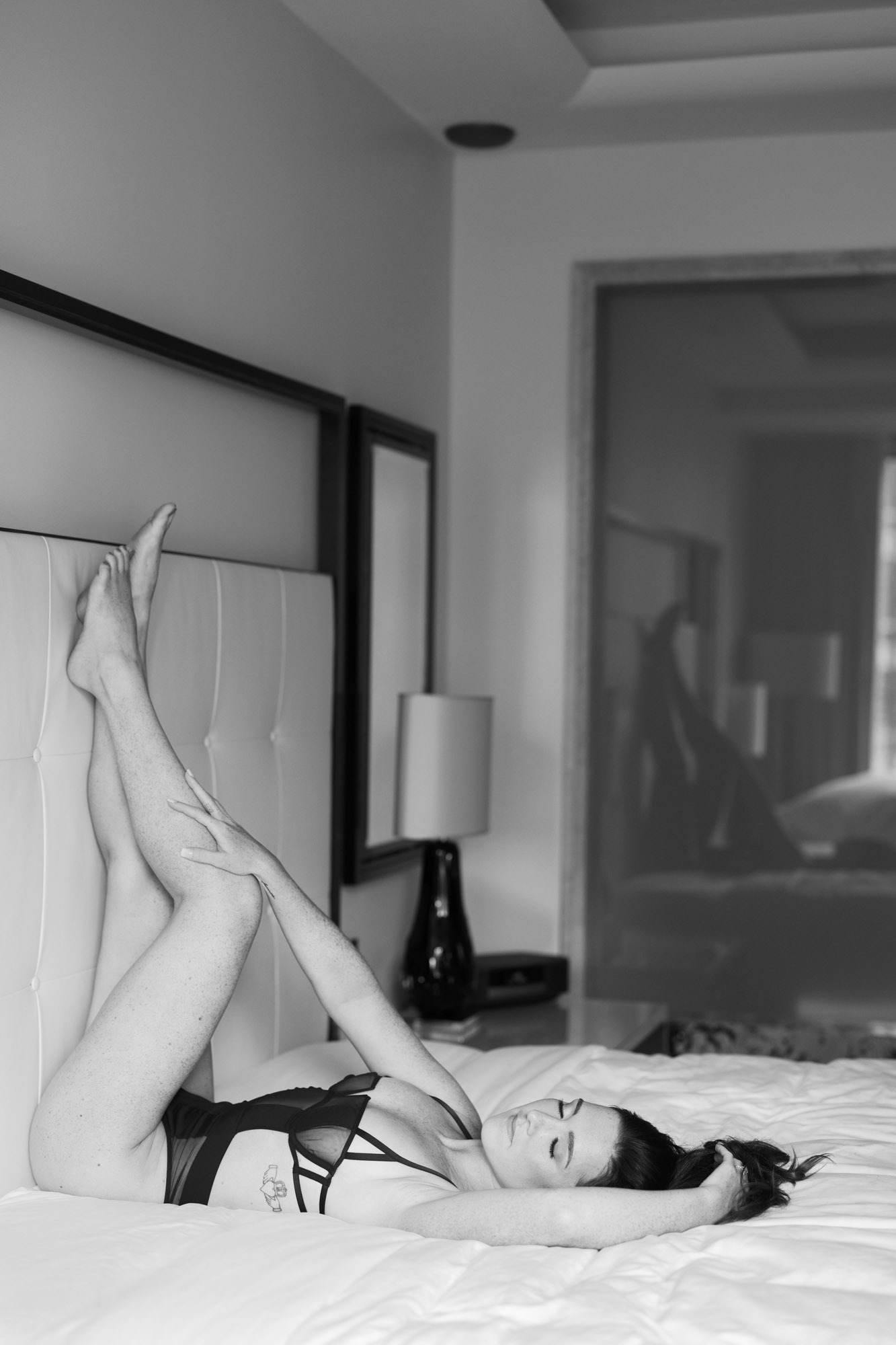 A black and white boudoir photo at the Langham Hotel in Chicago.