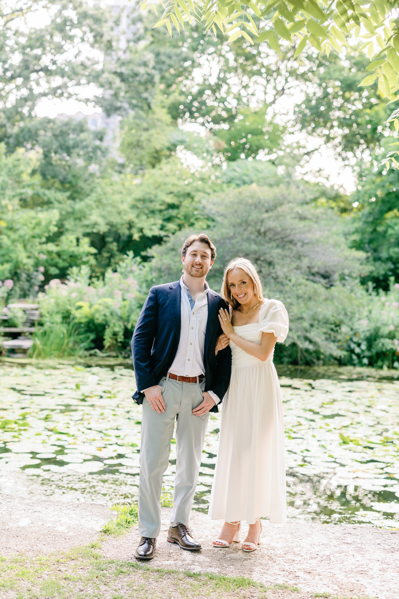 An engagement photo taken in Alfred Caldwell Lily Pool.