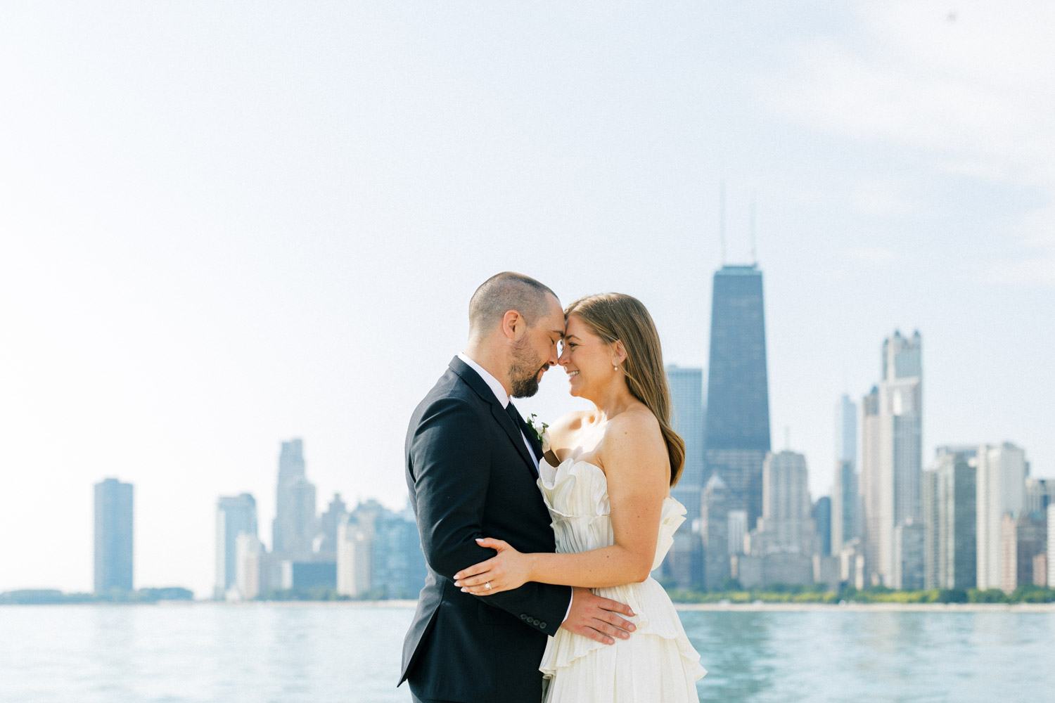 A Chicago elopement portrait in front of the city skyline