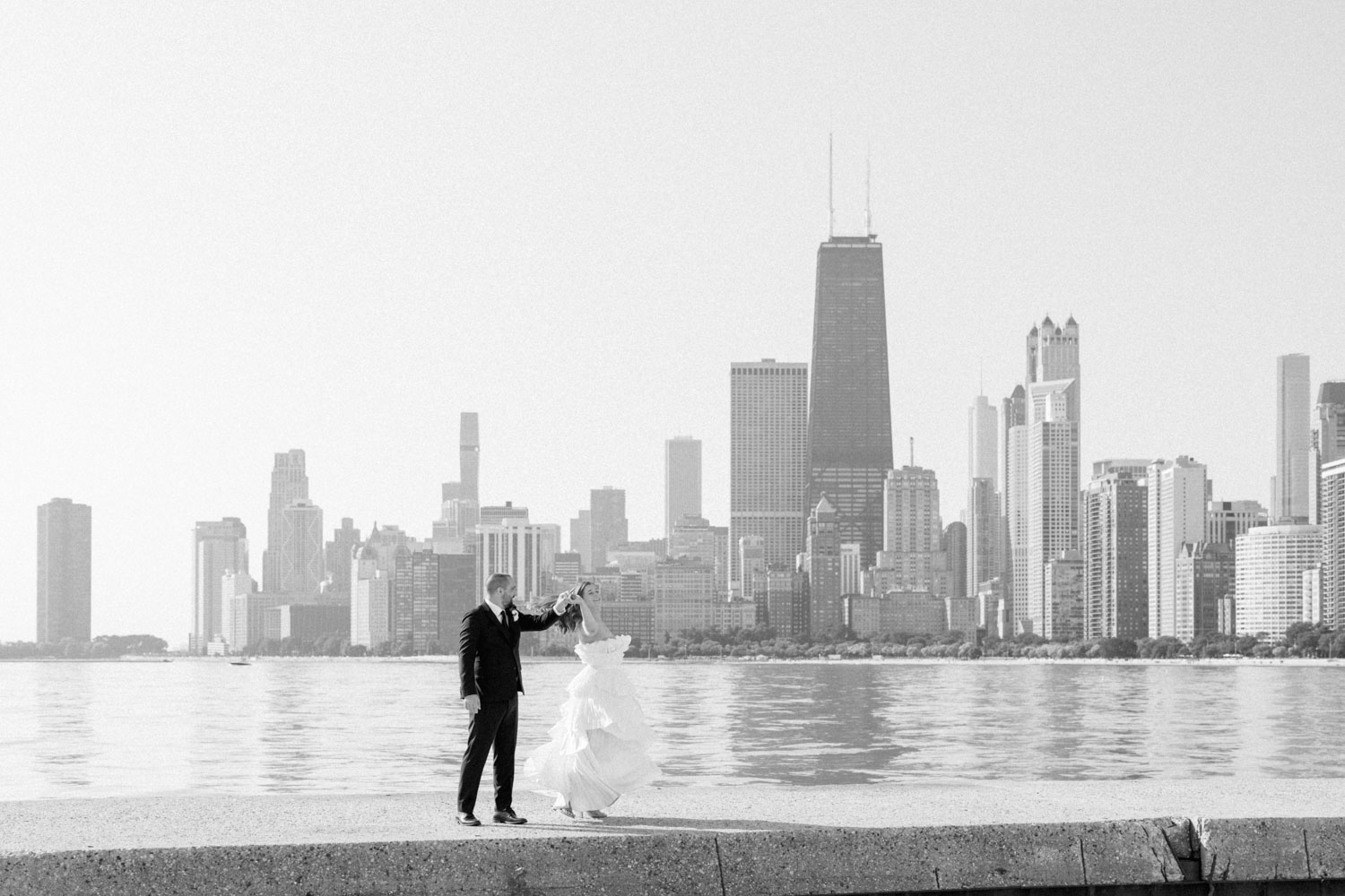A Chicago elopement portrait in front of the city skyline