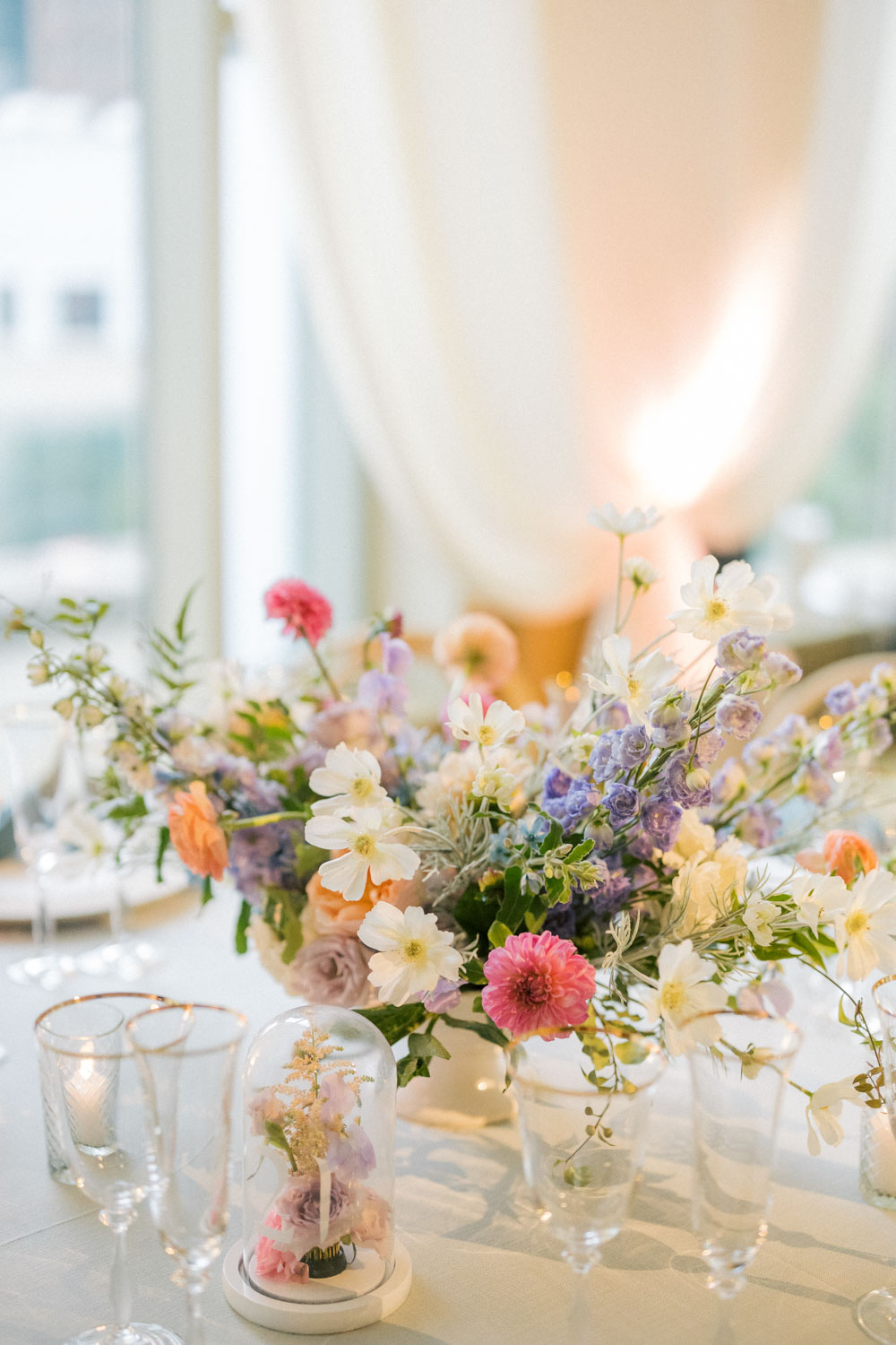 A colorful floral arrangement for a wedding at The Peninsula hotel in Chicago.