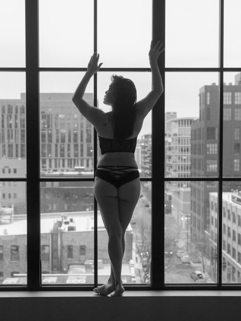 Chicago Boudoir Photographer Ashley Biess captures intimate portraits of women in luxurious hotel and loft settings