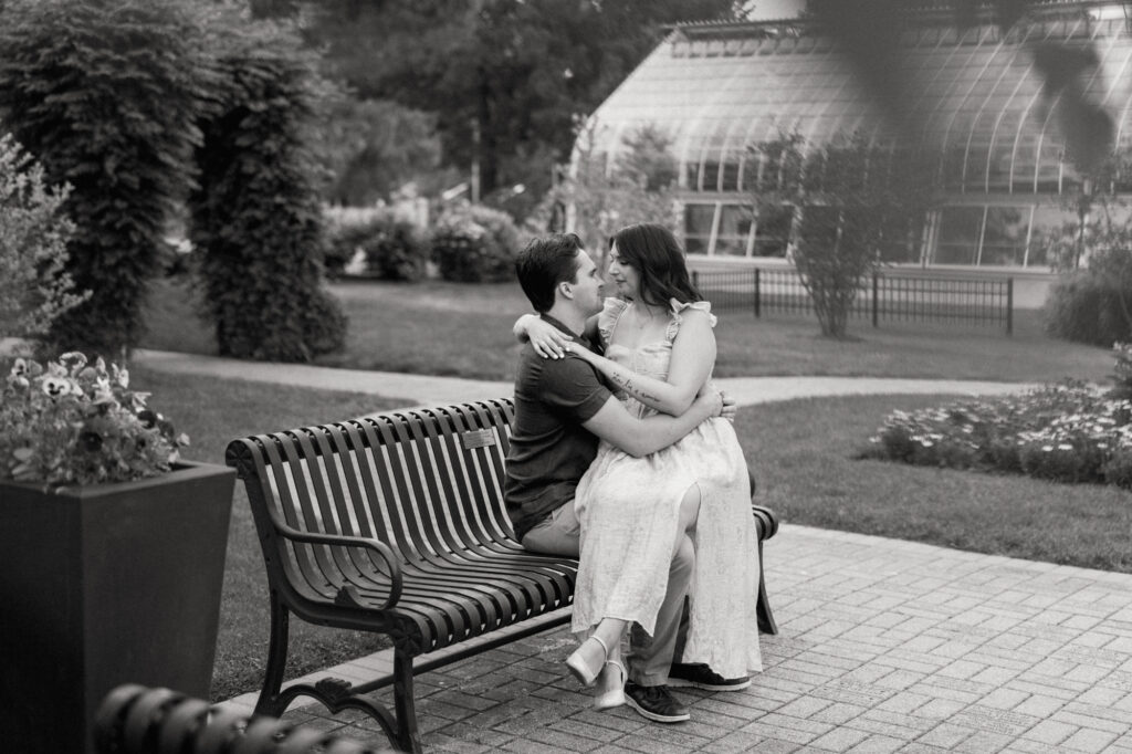 A black and white engagement photo taken at Elmhurst's Wilder Park.