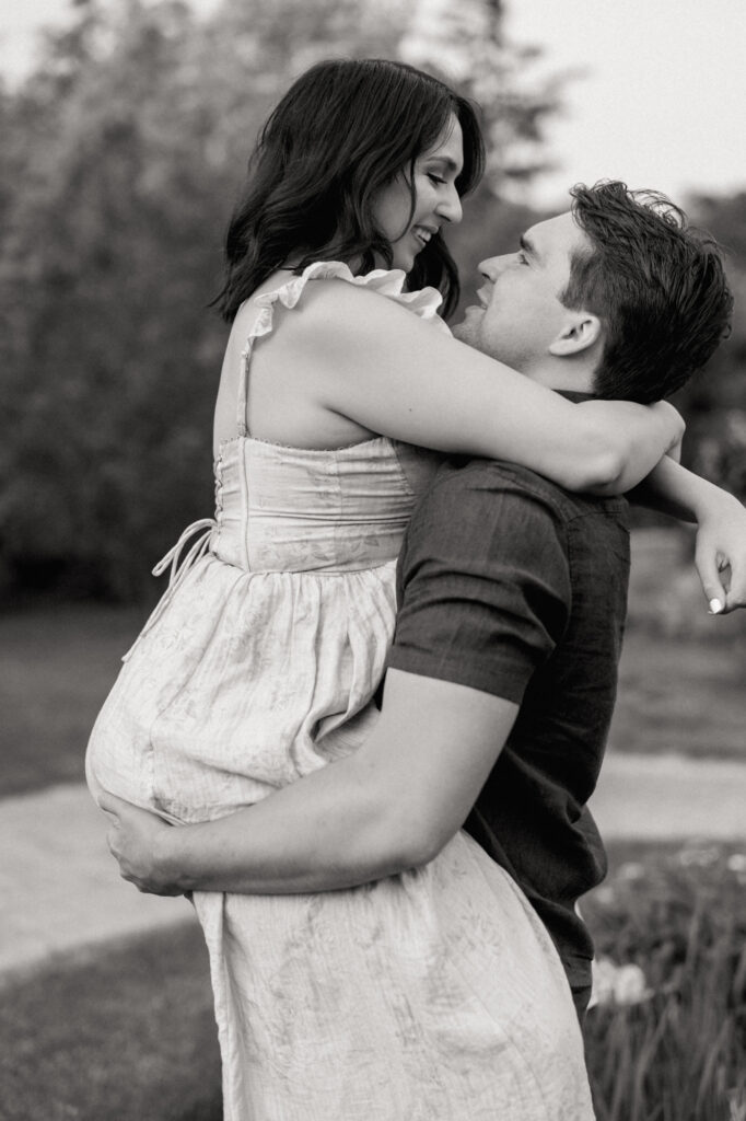 A black and white engagement photo taken in Elmhurst