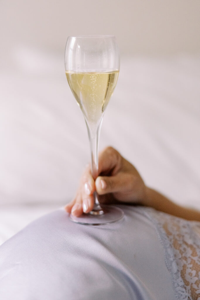 Close-up of lingerie details during high-end boudoir session in Chicago hotel