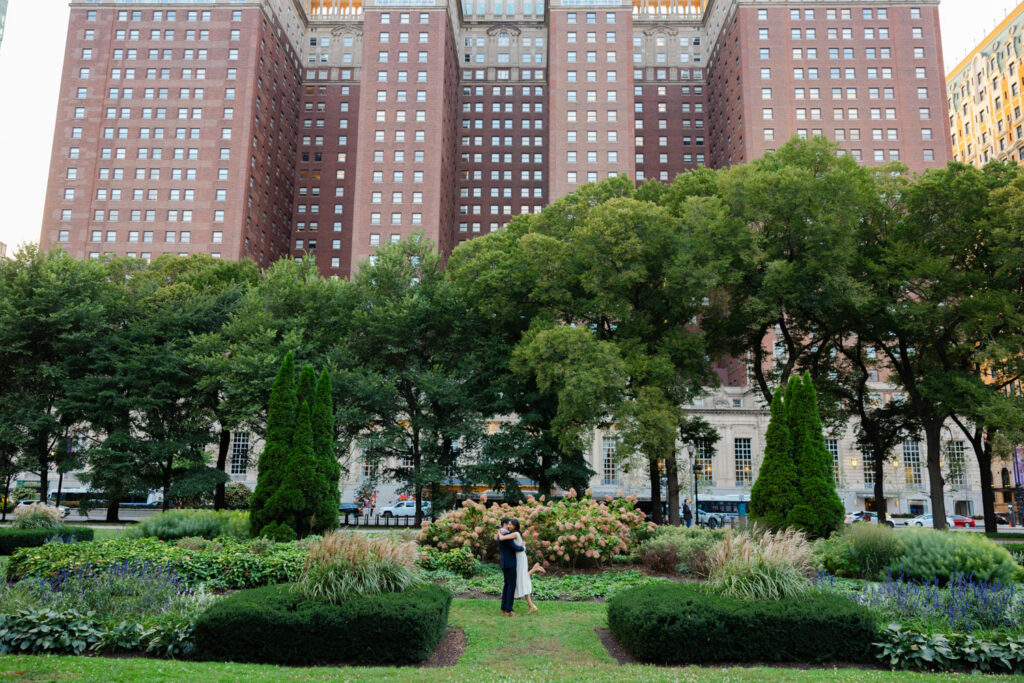 Chicago skyline rising above trees along Michigan Avenue gardens