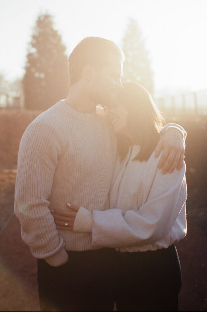 Romantic couple portrait in warm sunrise light at Elawa Farm Lake Forest captured on film.