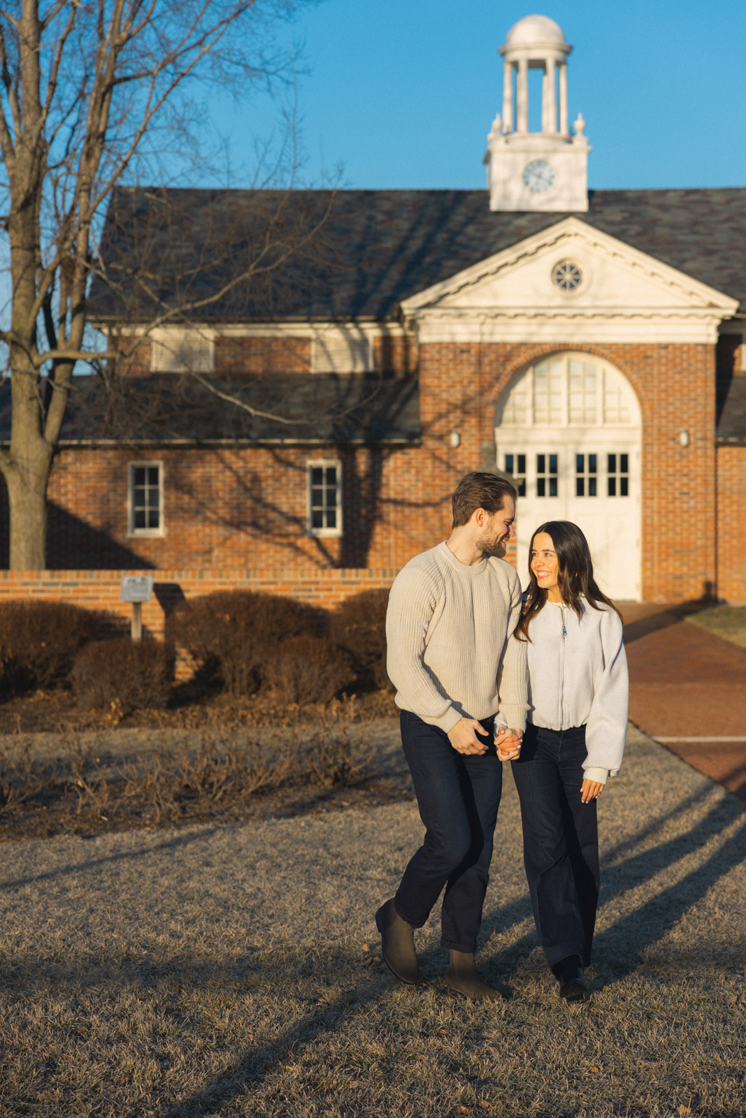 Couple walking together at Elawa Farm in Lake Forest during sunrise engagement session