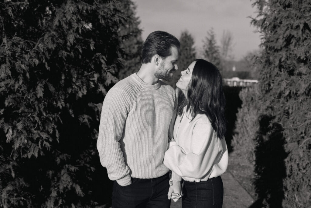 Black and white portrait of couple standing together at Elawa Farm