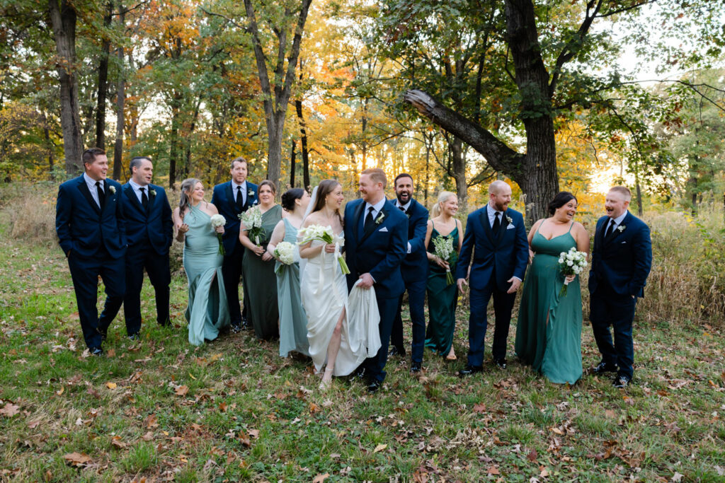 Wedding party celebrating together outdoors at the Arboretum