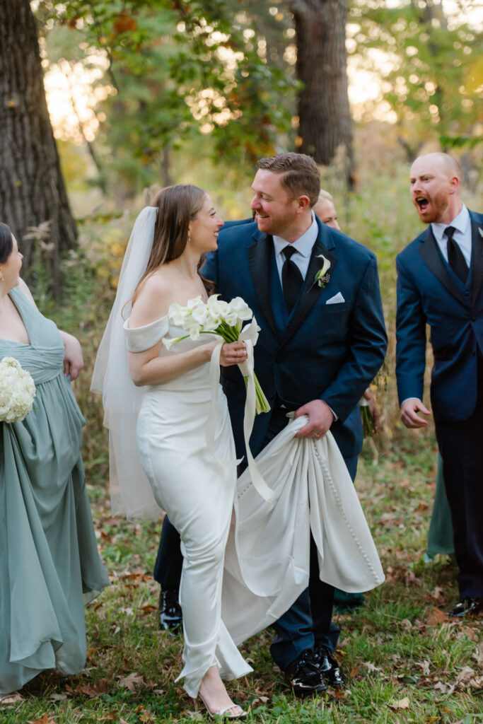 Wedding party celebrating together outdoors at the Arboretum