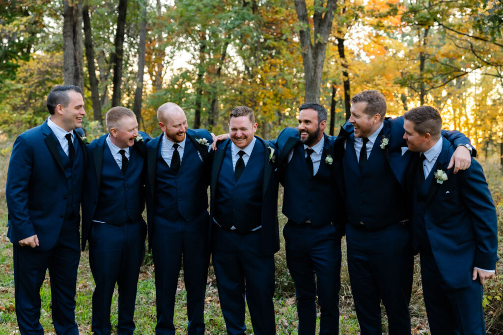 Groomsmen standing together at Morton Arboretum wedding