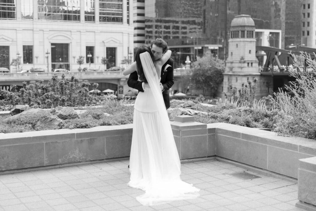 Bride and groom share a first look moment along the Chicago Riverwalk before their RPM Events wedding
