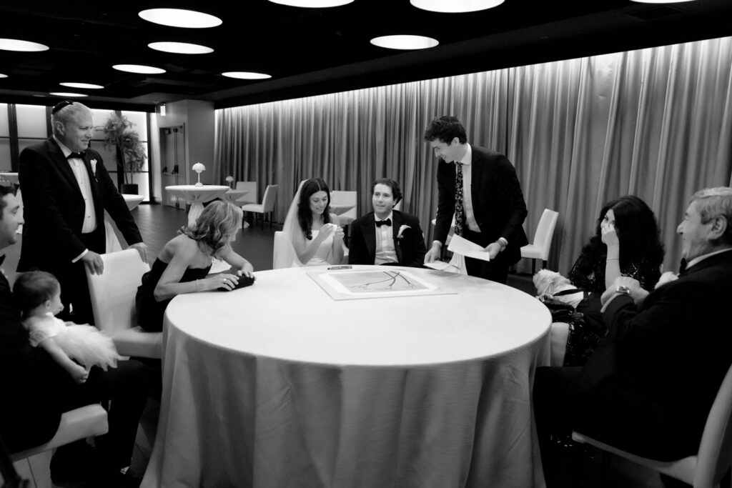 Family witnessing the ketubah signing before the ceremony at RPM Events wedding in Chicago.