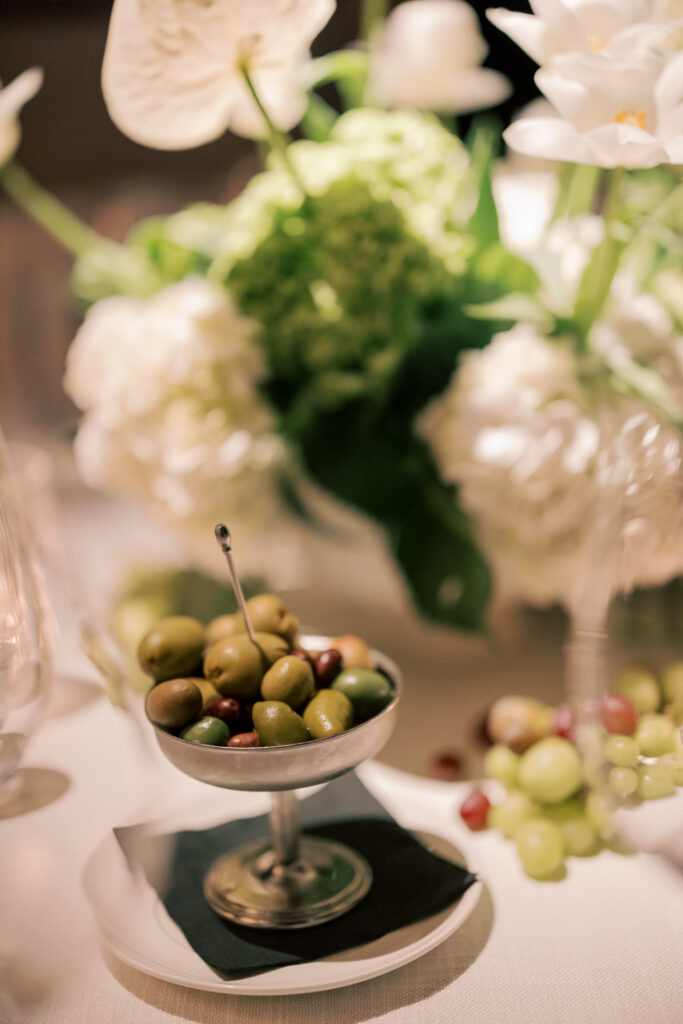 Close up of candlelight and floral arrangements at Chicago RPM Events wedding reception.