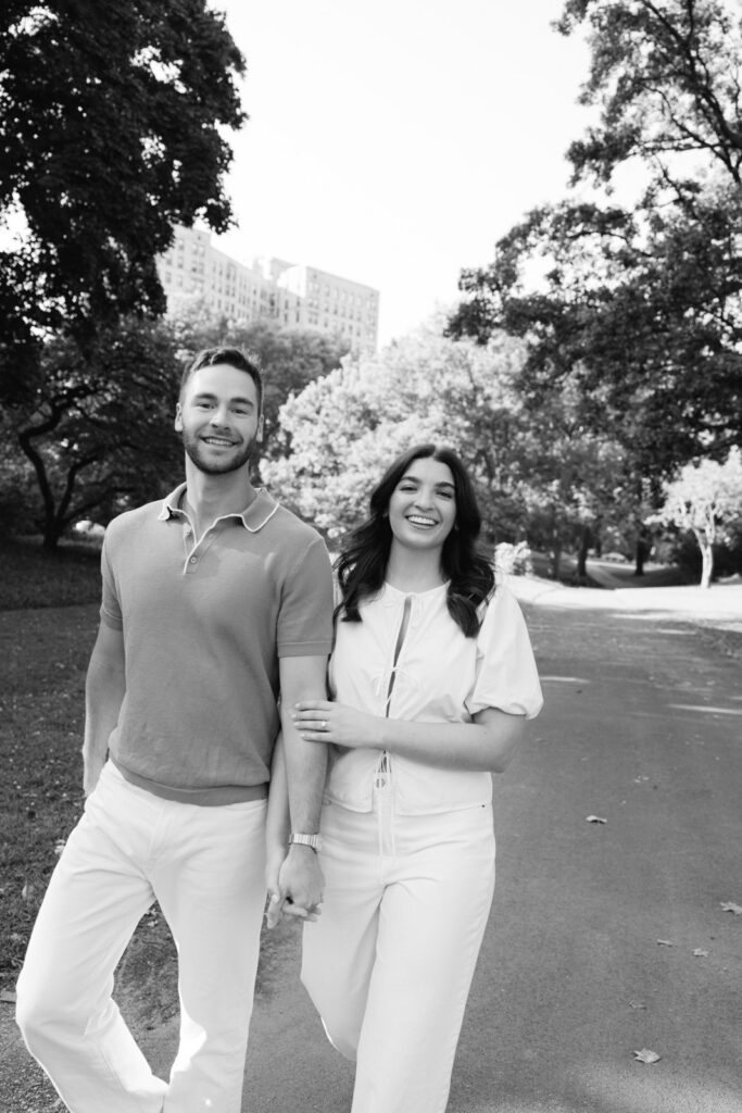Couple walking side by side in Lincoln Park neighborhood Chicago engagement session