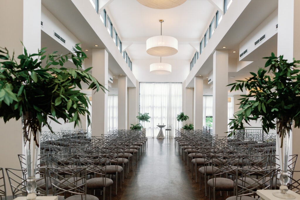 Ceremony space at Mae District in Chicago with rows of chairs and natural light filling the room.