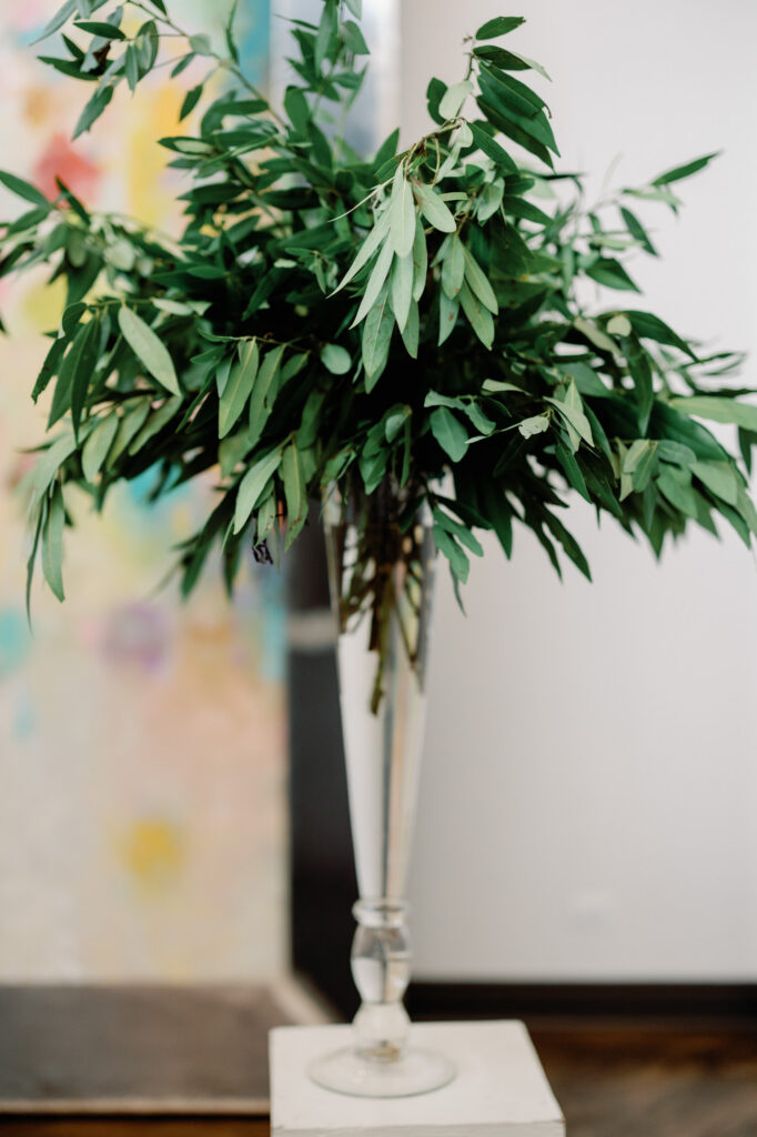 Minimal floral arrangement detail at the ceremony at Mae District Chicago.