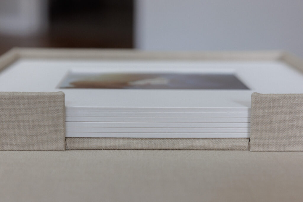 Linen keepsake box with matted engagement photos printed on fine art paper