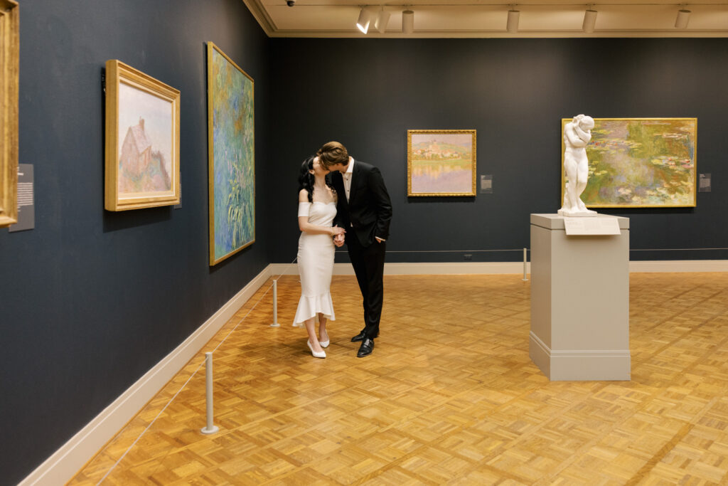 Art Institute Chicago gallery engagement photo with paintings and parquet floors