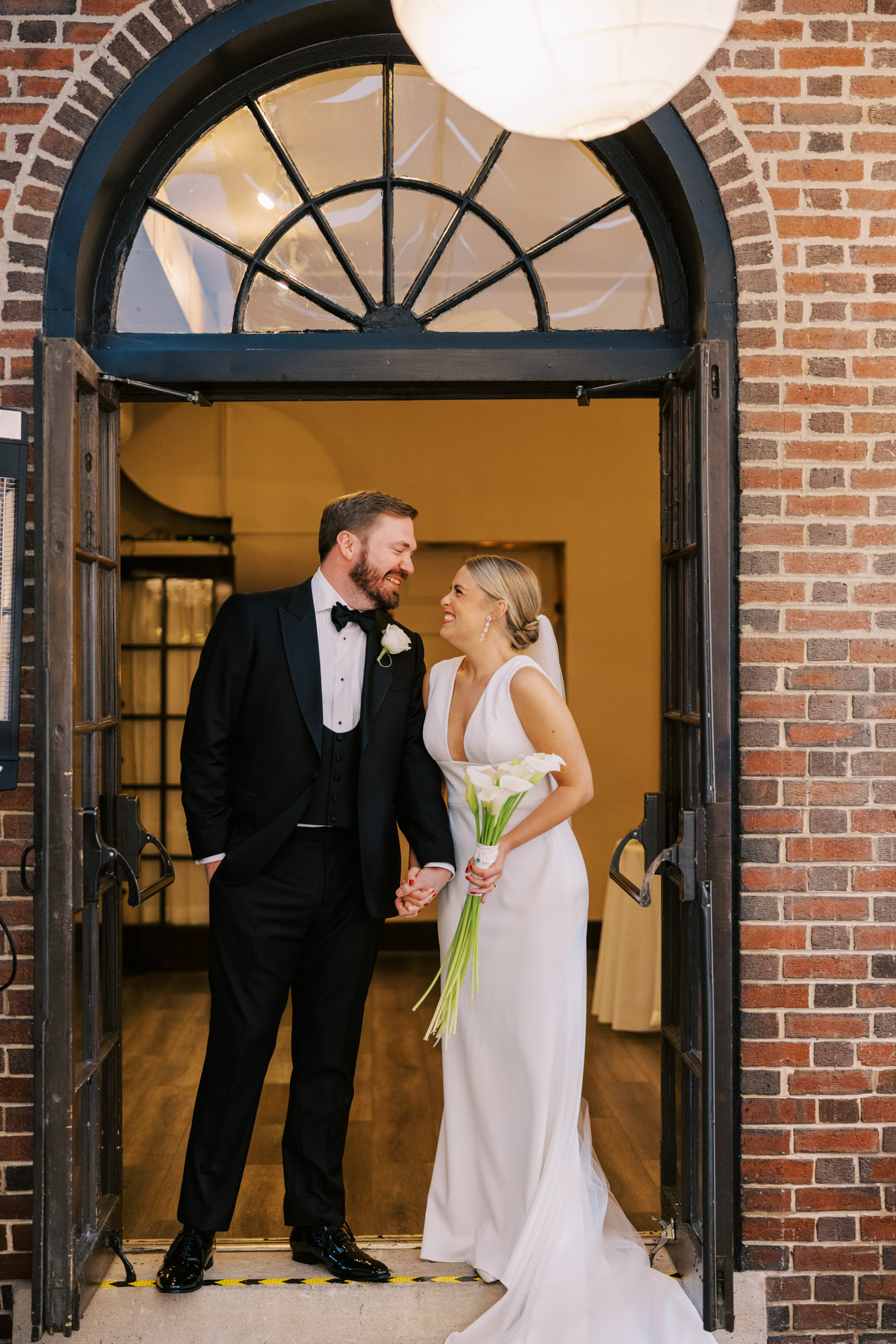 Lincoln Park Wedding At Salvatore’s Chicago Couple At Entrance