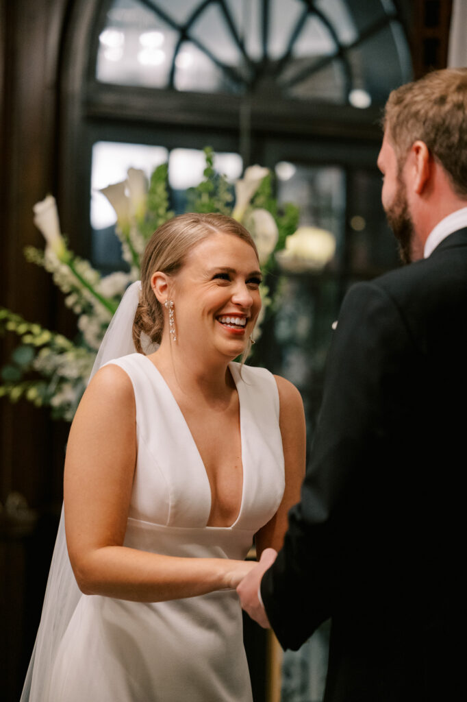 Bride And Groom Holding Hands During Ceremony