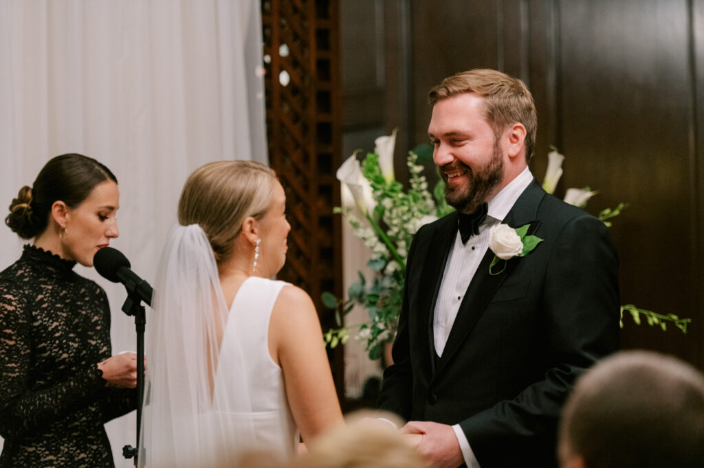 Bride And Groom Holding Hands During Ceremony