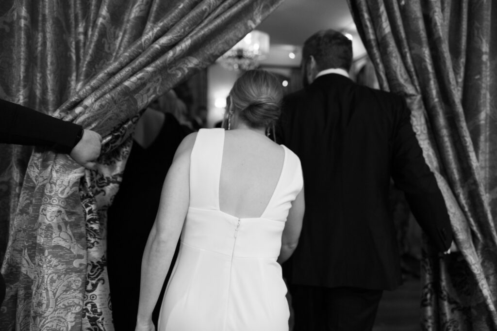 Couple Entering Reception Through Curtains Salvatore’s Chicago