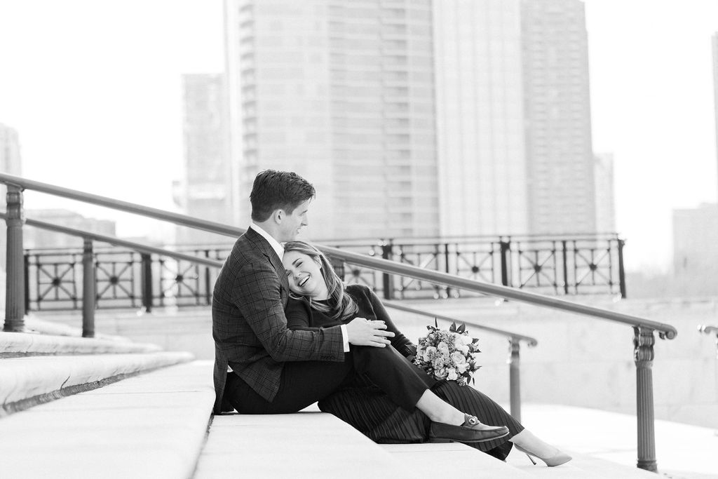 Couple sitting together overlooking Chicago skyline