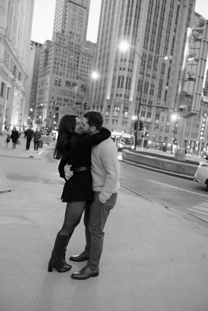 Romantic Night Engagement Photo Couple Kissing In Chicago Street