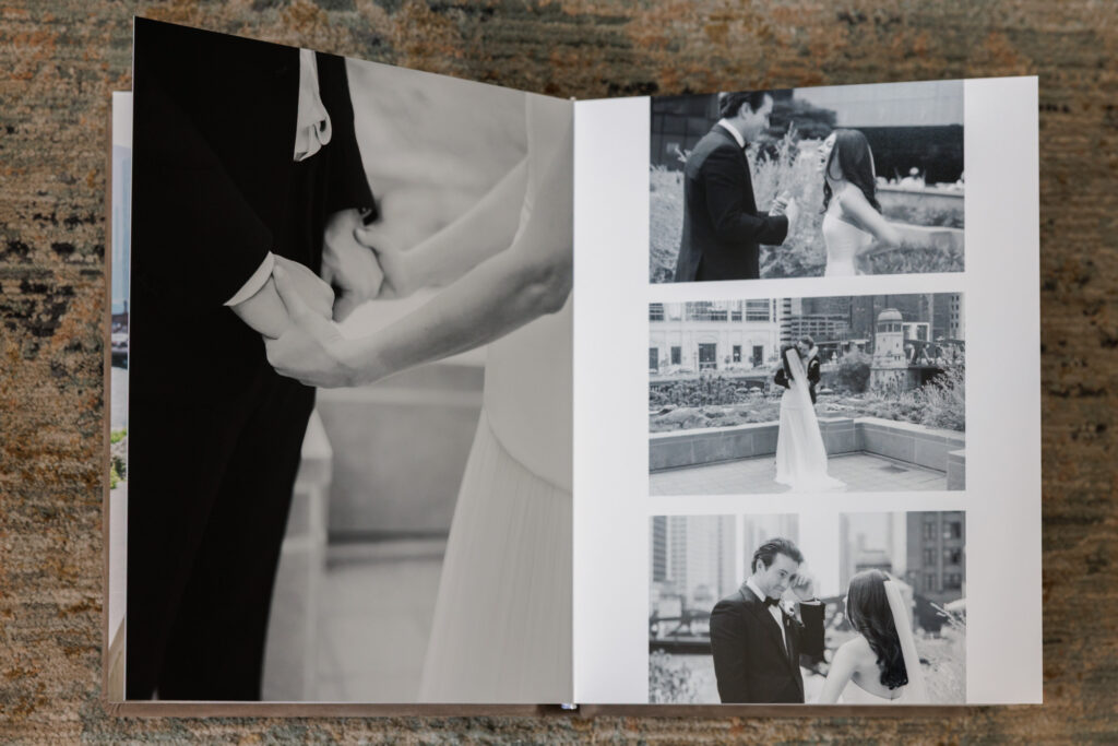 Full bleed black and white bridal portrait displayed in a fine art wedding album