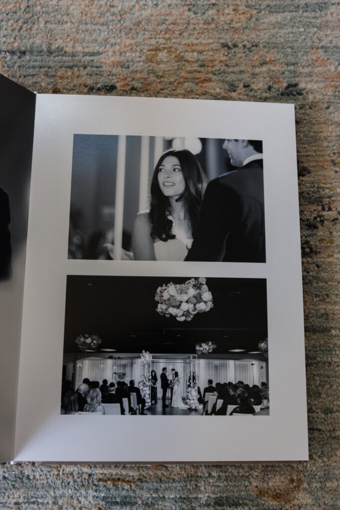 Black and white wedding ceremony moments displayed across a minimalist album spread