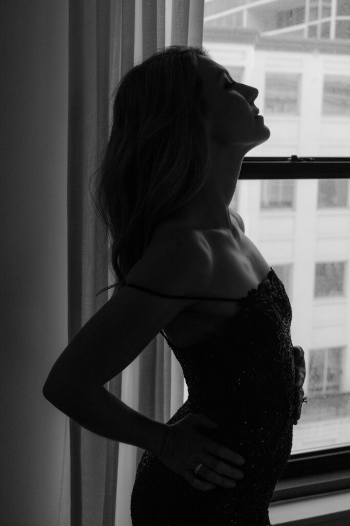 Sequin dress boudoir portrait in low light
